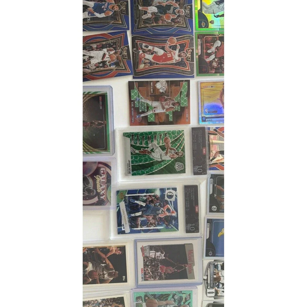 Panini 48-Card NBA 2023-24 Lot Hoops Rookies, MJ Bonus graded Luka and Tatum